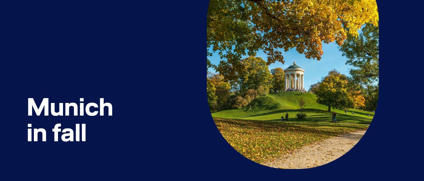 Temple in the English Garden park on a grassy hill surrounded by colorful fall trees in Munich, Germany.